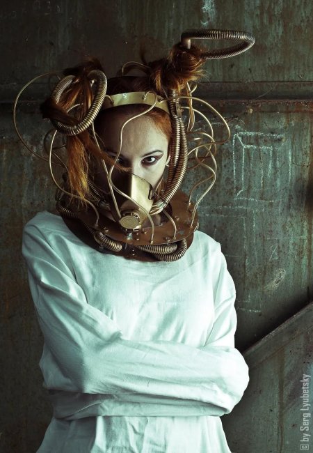 Сумасшедший в смирительной рубашке