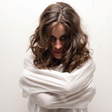 Женщина в смирительной рубашке