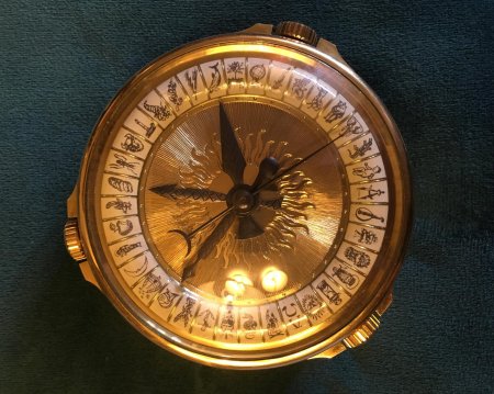 Алетиометр золотой компас
