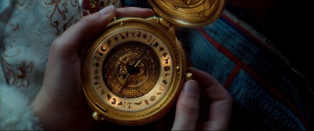 Алетиометр золотой компас