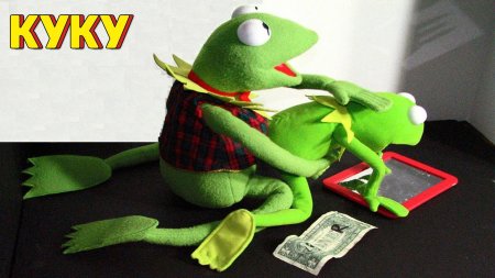 Игрушка лягушка