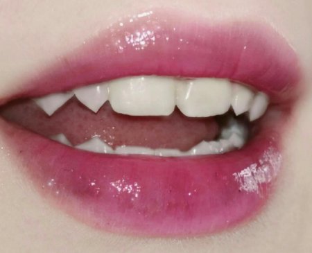 Зубы с клыками