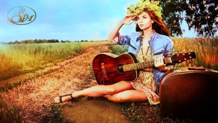 Красивая девушка с гитарой