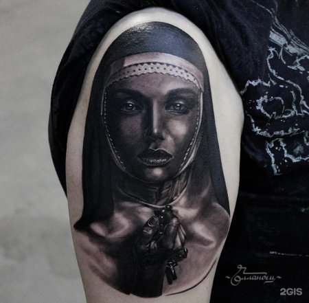 Тату монашка
