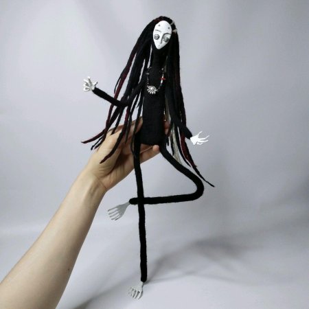 Демоническая кукла