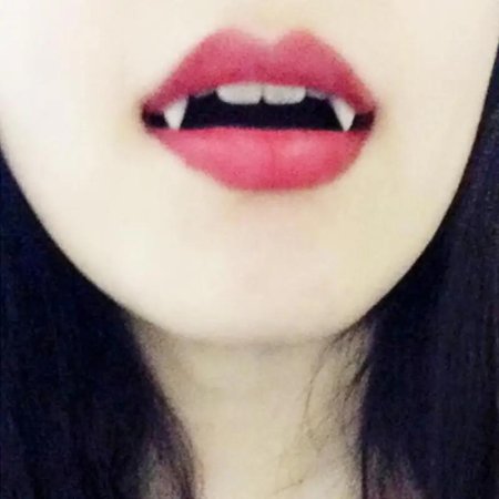 Нарощенные клыки