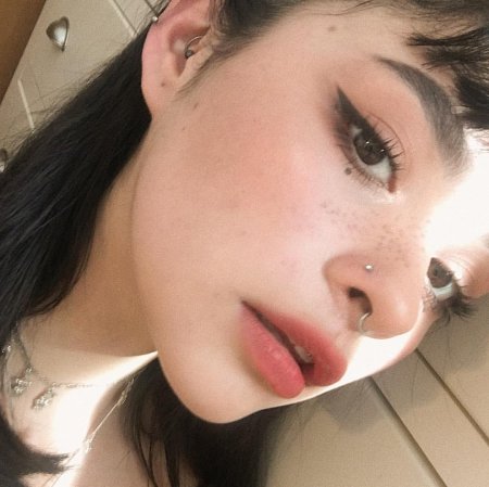 Пирсинг носа септум