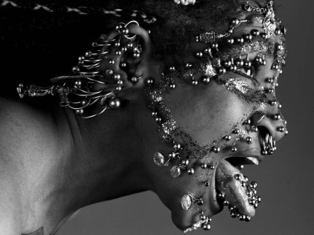 Человек с самым большим количеством пирсинга