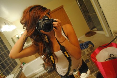 Девушка с фотоаппаратом
