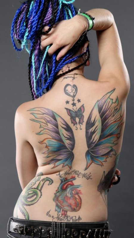 Женская тату на спине