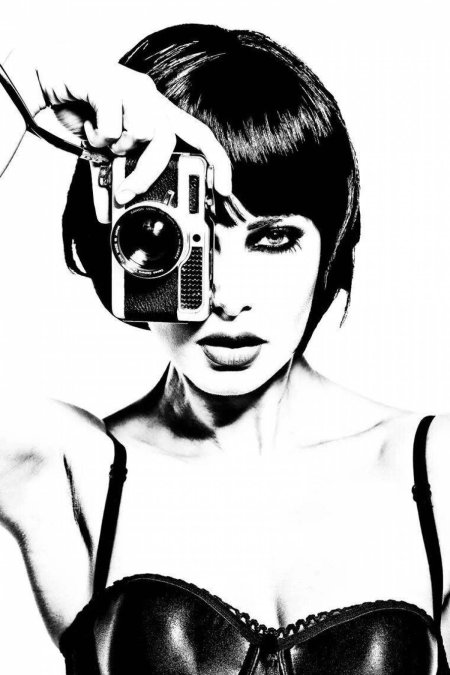 Девушка с фотоаппаратом