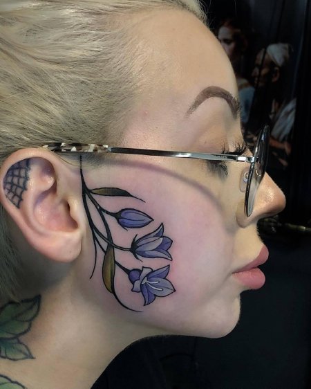 Тату на лице