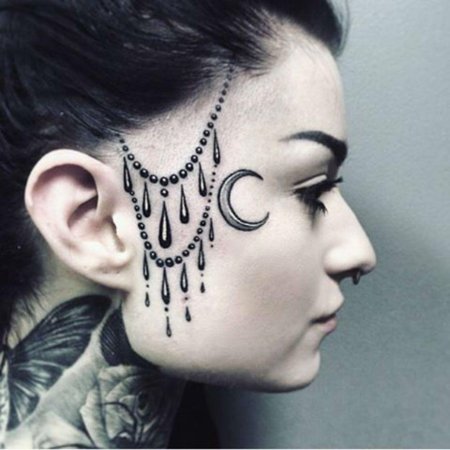 Тату на лице