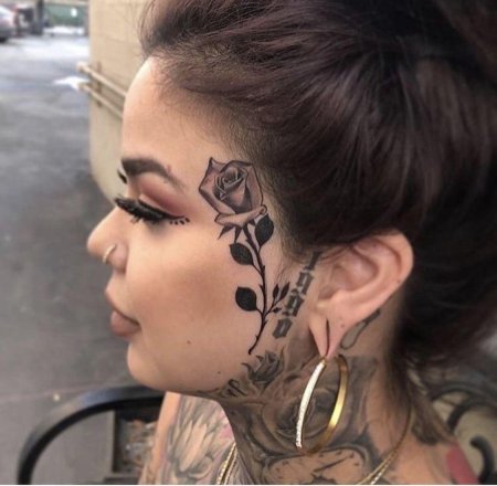 Тату на лице