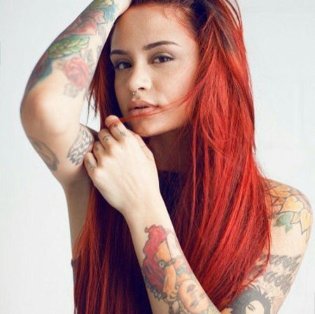 Тату рыжая