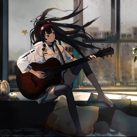 Девушка играет на гитаре