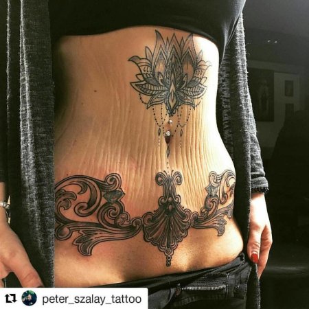 Тату на живот для девушек