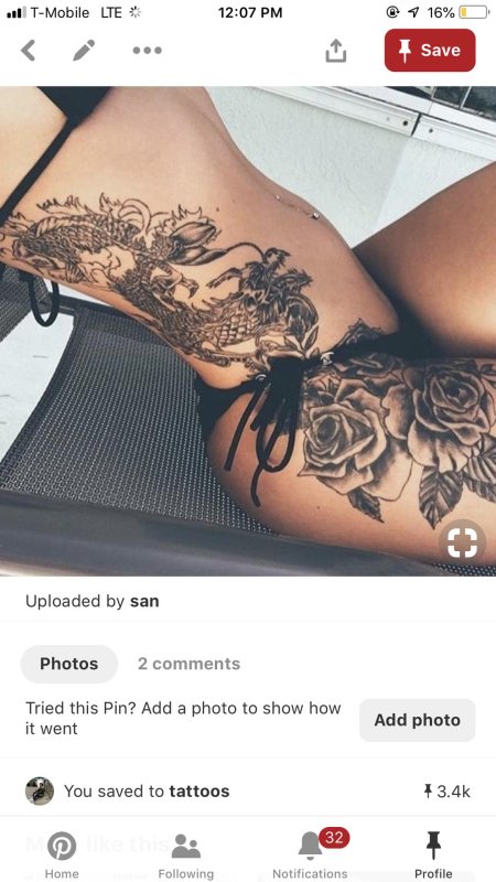 Тату дракона на бедре