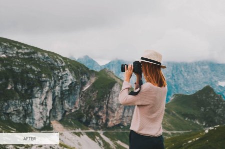 Девушка с фотоаппаратом в горах
