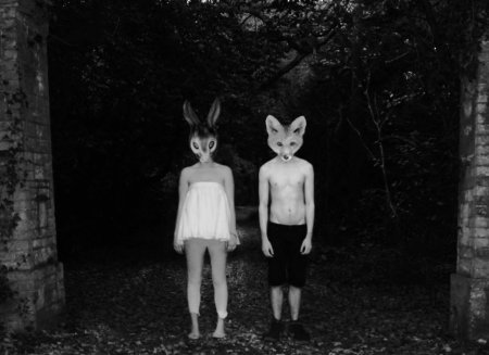 Люди в масках животных