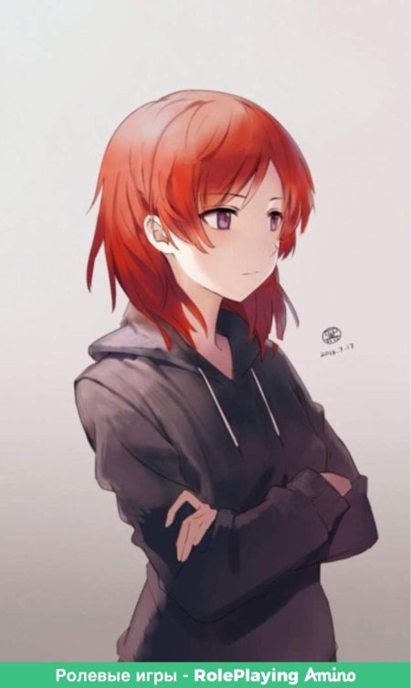 Девушка с короткими рыжими волосами