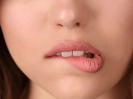 Закусывание губы