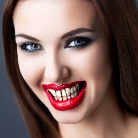 Зубы с клыками