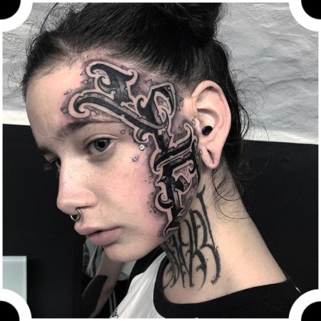 Тату на лице