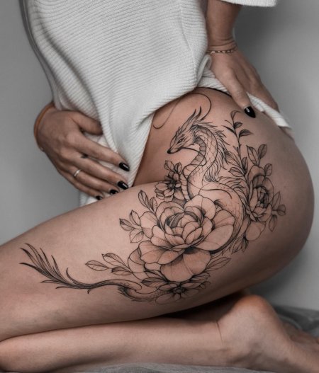 Тату на бедре для девушек дракон