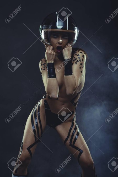 A man in a Motorcycle Helmet naked with a girl