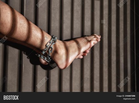 Legs in Metal bondage