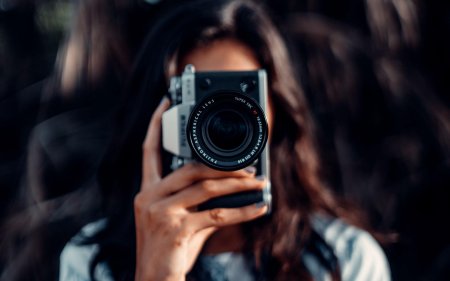 Девушка фотограф