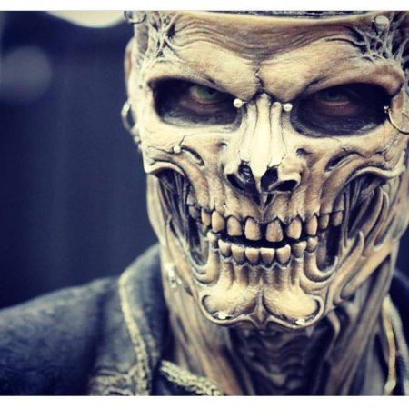 Череп в маске тату