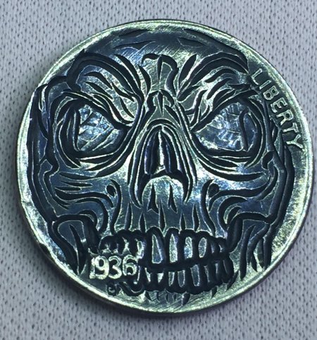 Монета с черепом