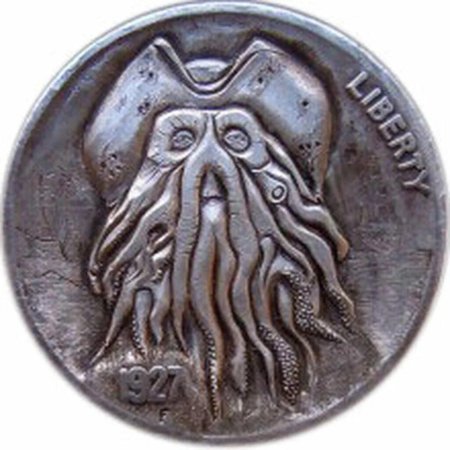 Монета пираты Карибского моря