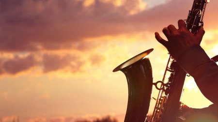 Саксофон духовой музыкальный инструмент