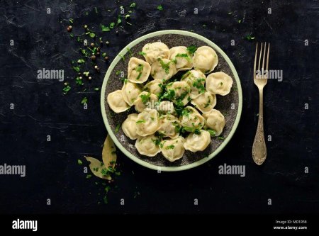 Пельмени в тарелке