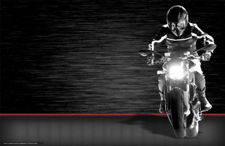 Мотоцикл на черном фоне