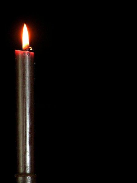 Горящая свеча