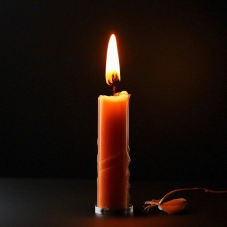 Горящая свеча