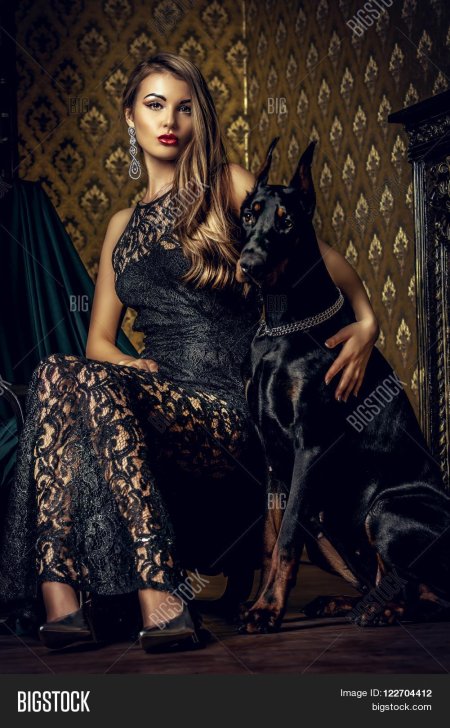 Ирина Шейк с доберманом