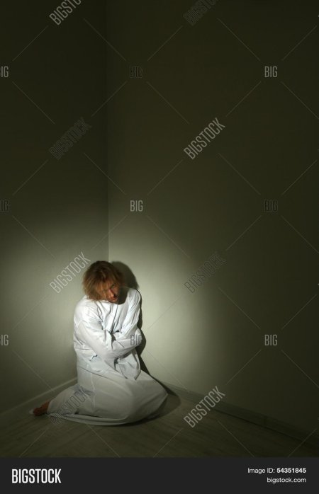 Человек в смирительной рубашке